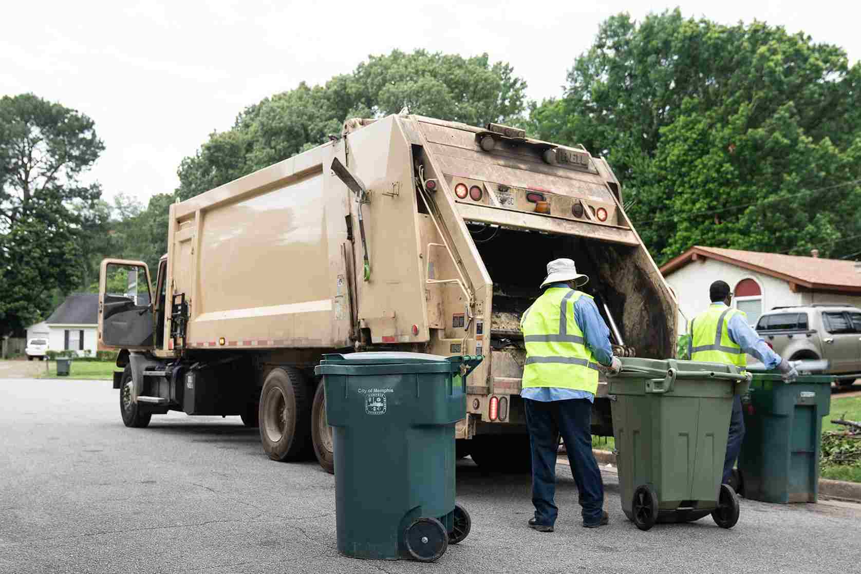 cleaning workers are disposing of hazardous waste in skip hire