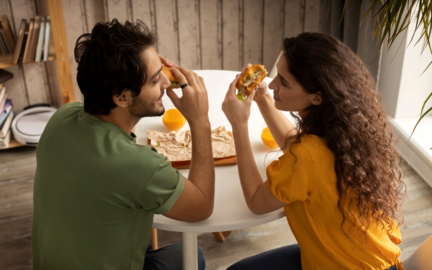 Couple enjoying eating fast food
